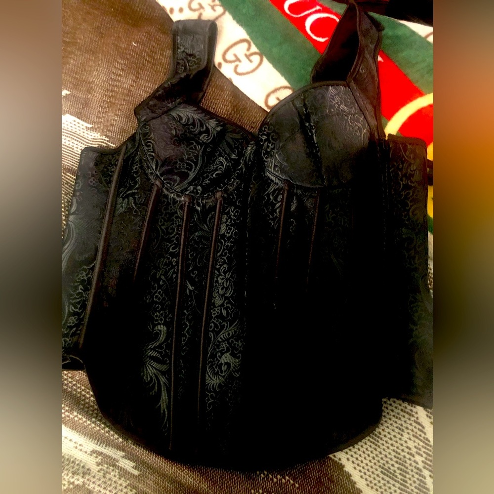 Corset with side zipper. Never worn